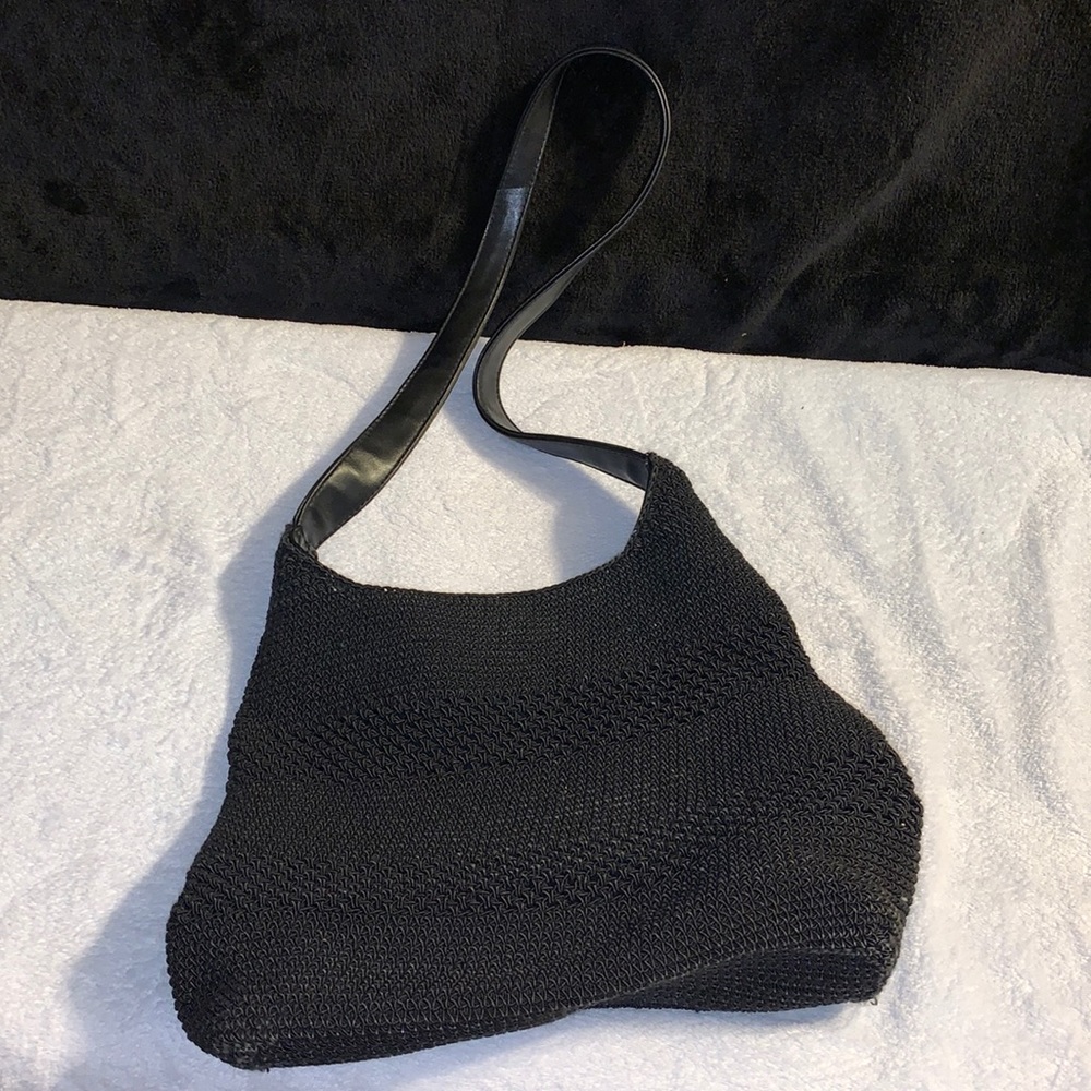 Crocheted black hobo purse with a leather strap